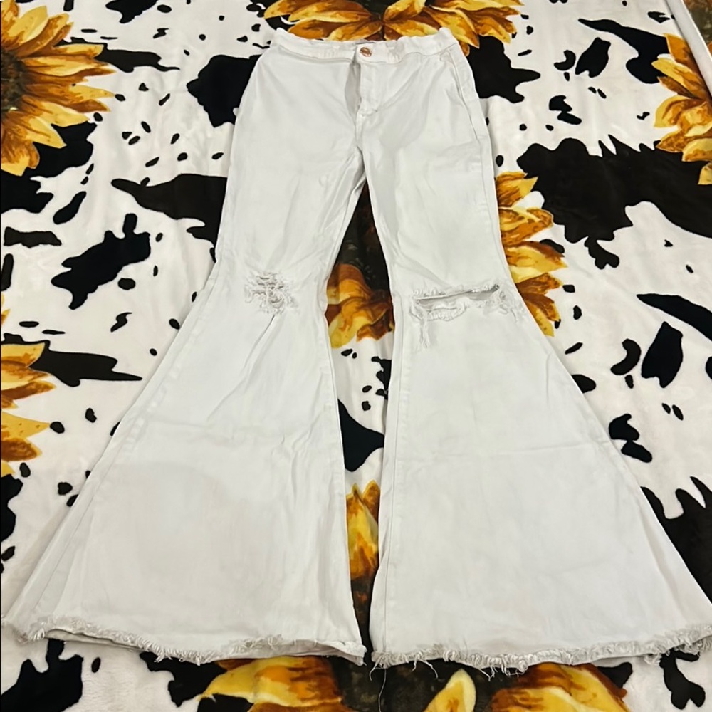 White Flared Jeans with Distressed Knees